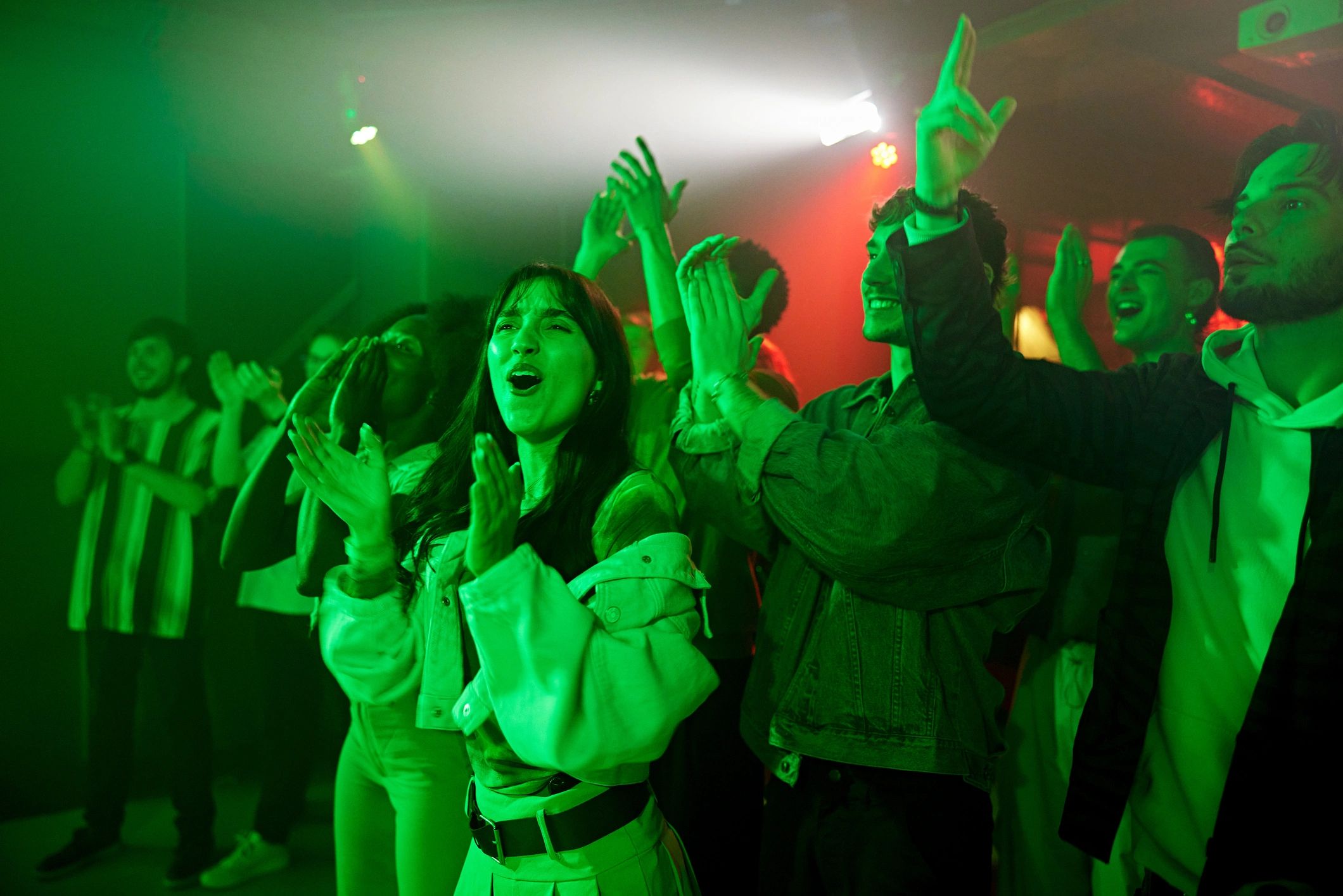 Guests applauding on a lively celebration dance floor