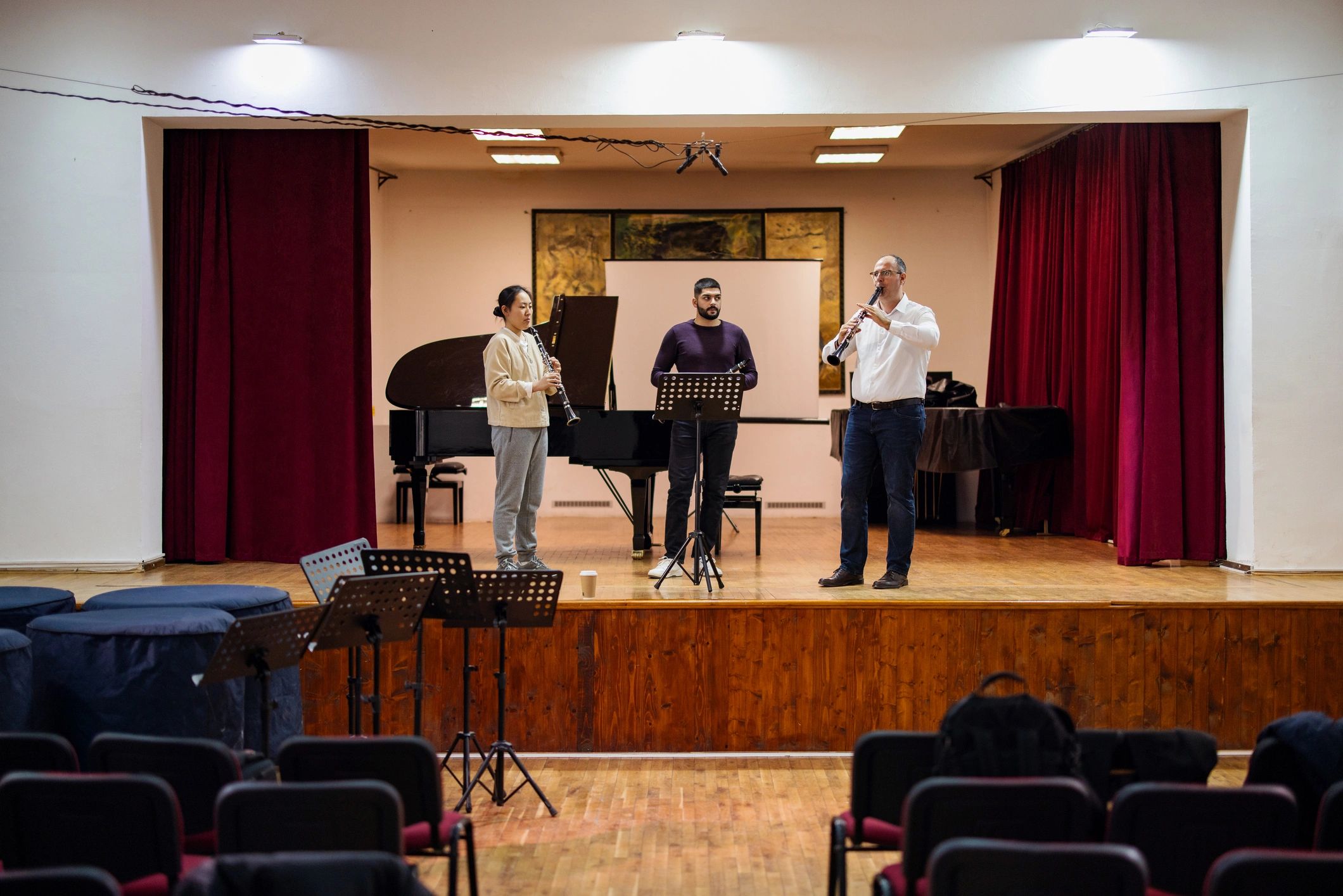Musicians and instructor sharing a live performance moment during an event