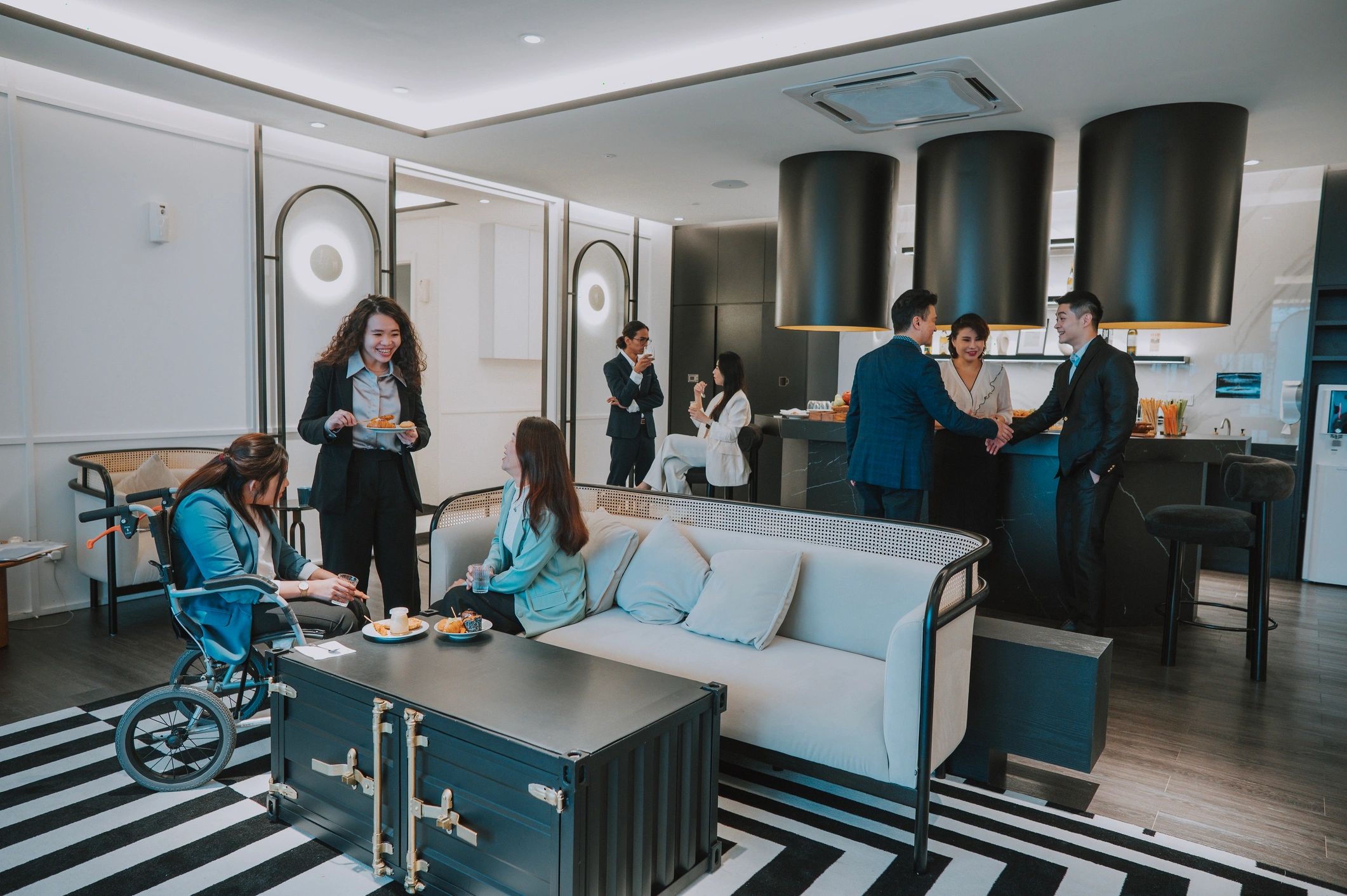 Professionals networking during a stylish corporate event gathering