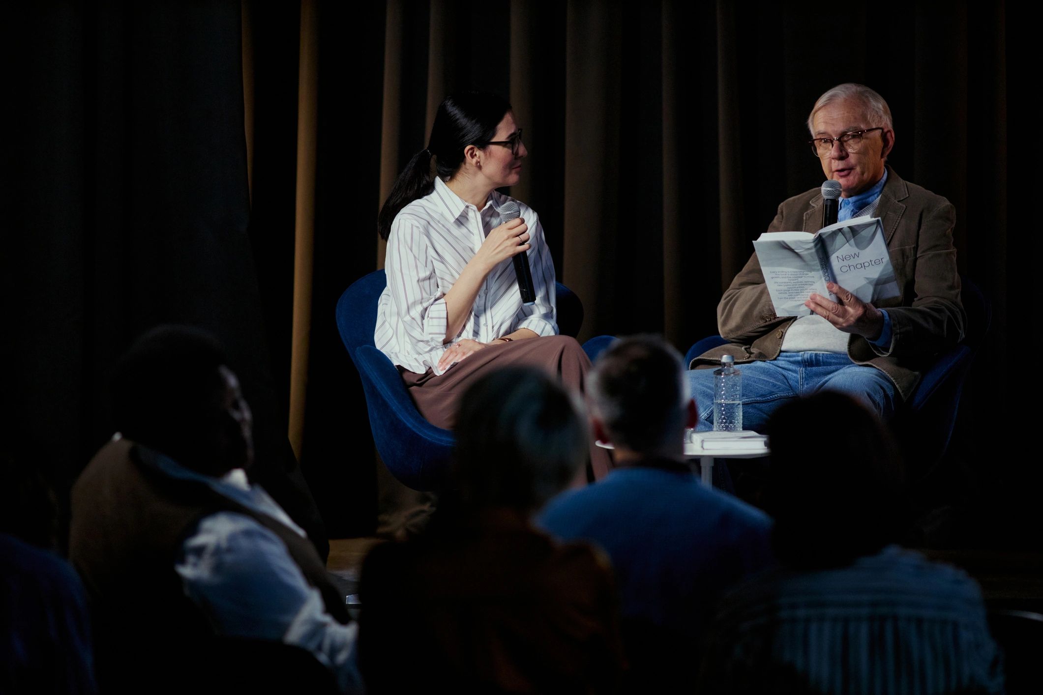 Audience watching a live immersive event presentation